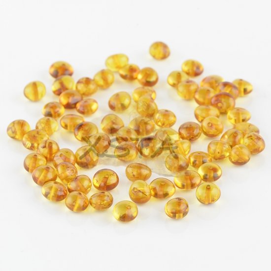 Polished cognac baroque amber beads 6-7 mm